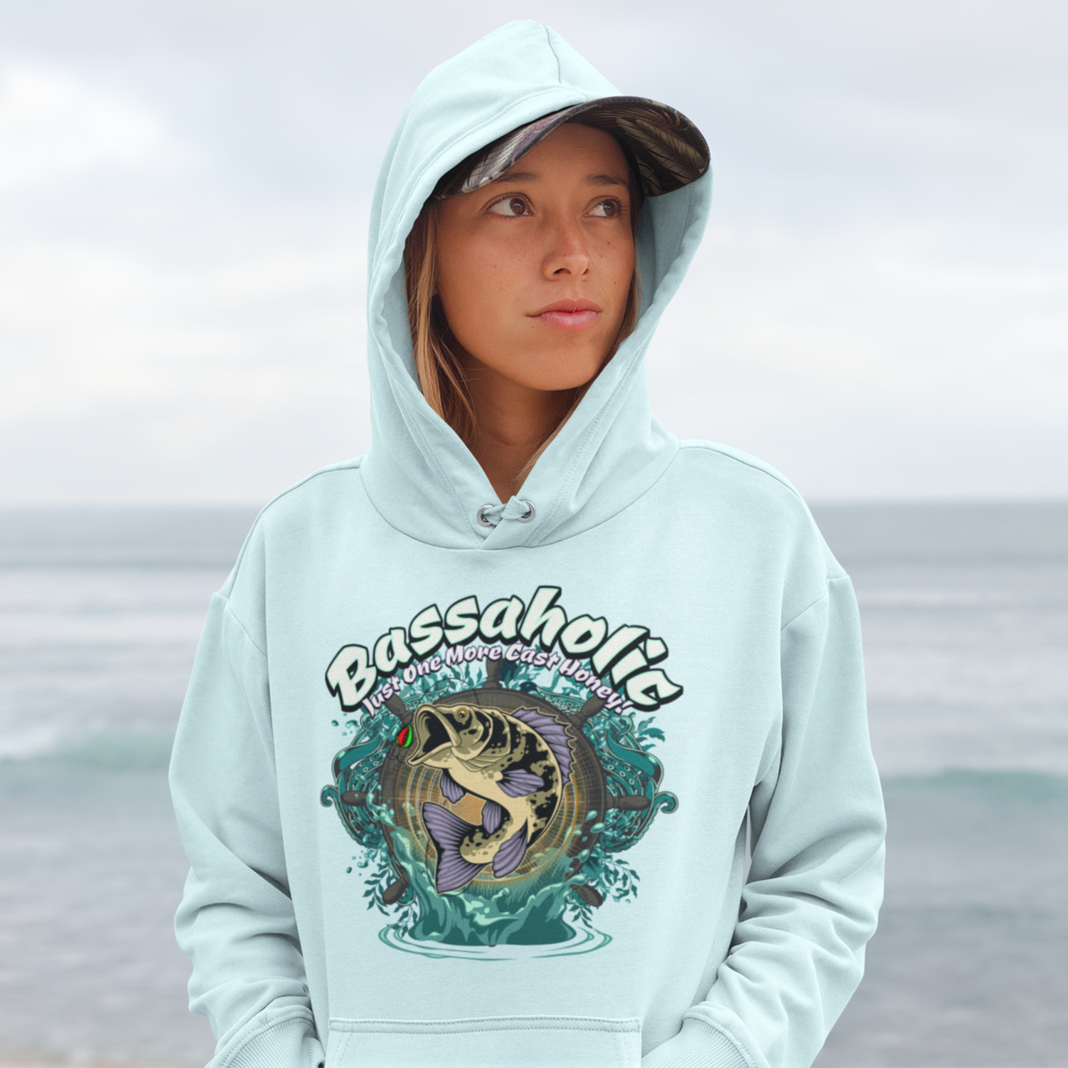 women wearing light blue fishing hoodie with graphic by Arczeal Designs
