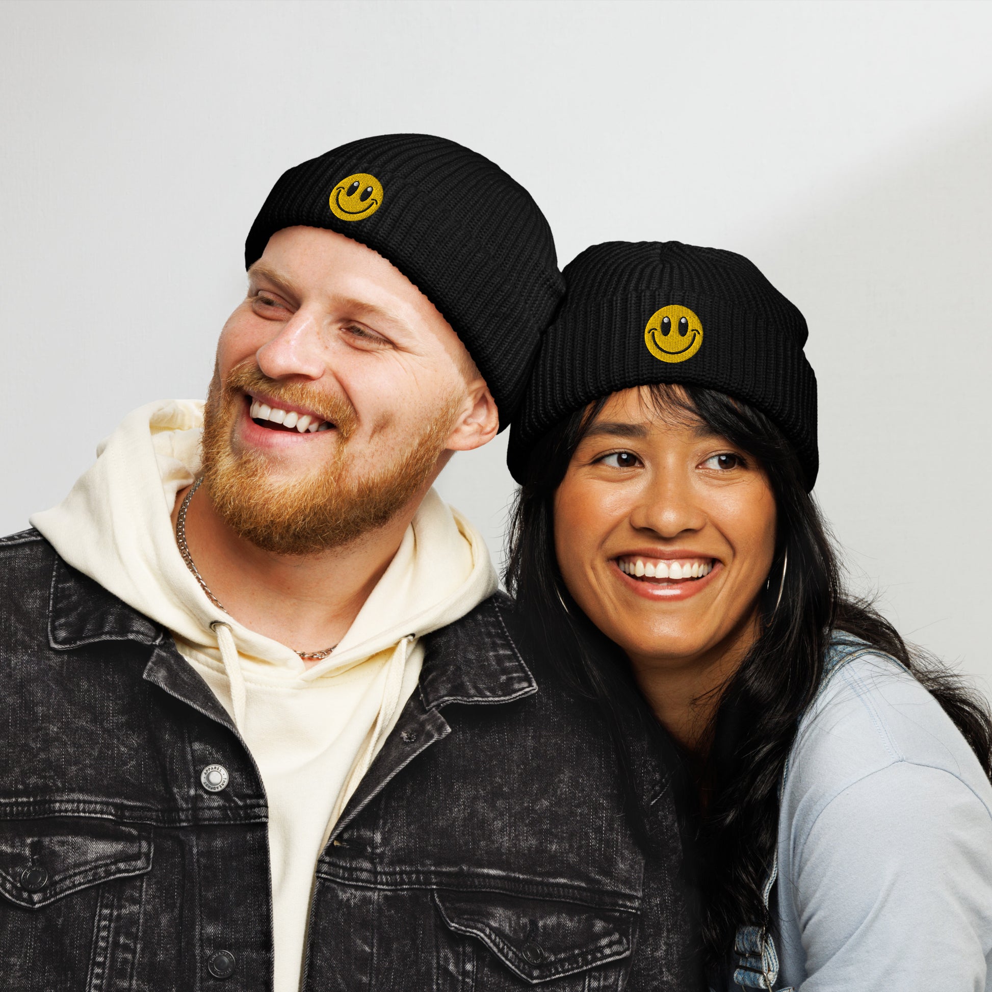 couple wearing Black Beanie Hat Smiley Face Embroidered Arczeal designs 